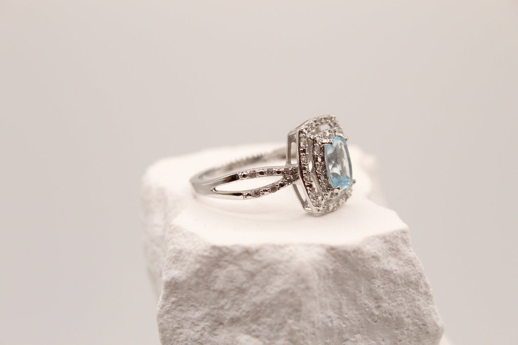 Sky Blue Topaz Halo Ring